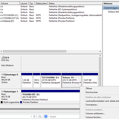 Datenträgerverwaltung von Windows 8.1 nach Partitionierung in der Datenträgerverwaltung mit geöffneten Dropdownmenü für eine Partition